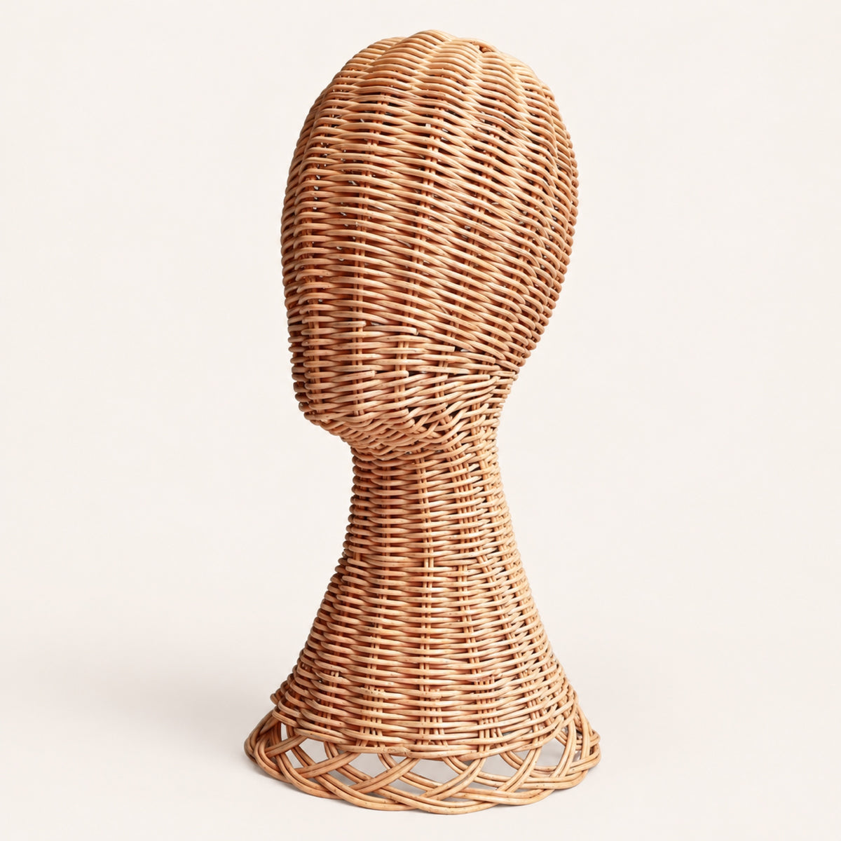 Tête porte-perruque en rotin tressé, 40 cm de haut, base ajourée, sans perruque